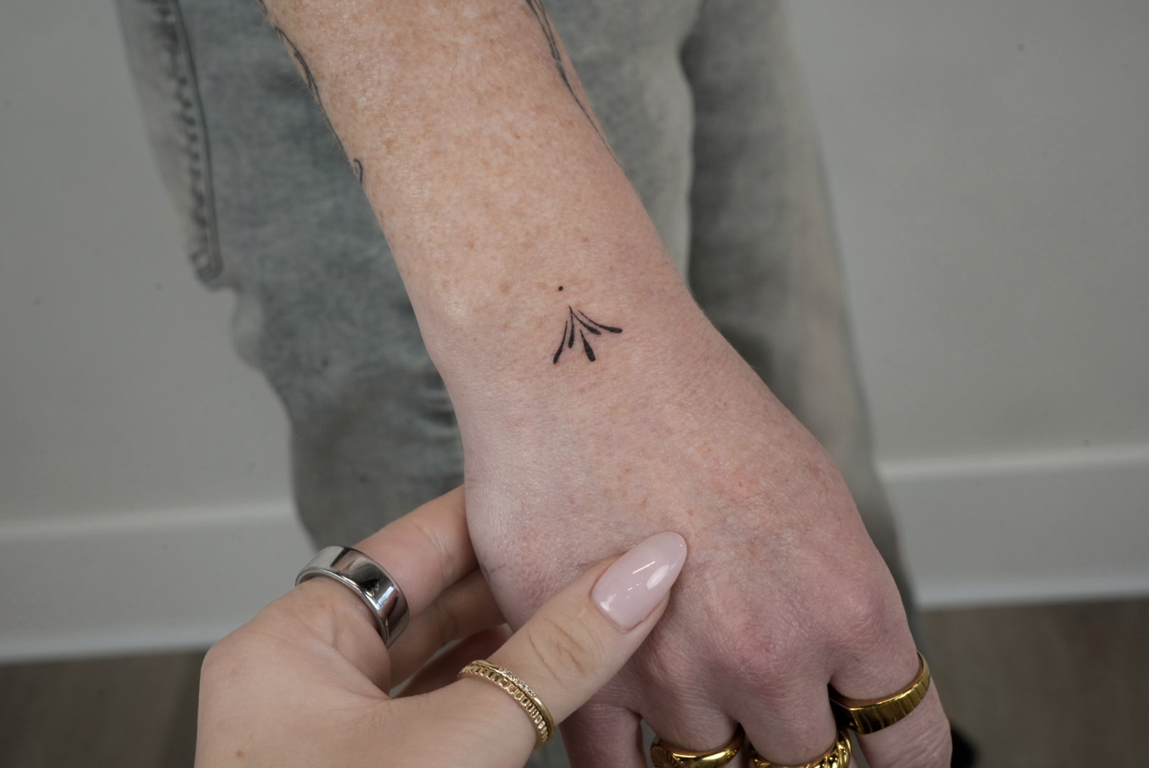 Fine-line tattoo work