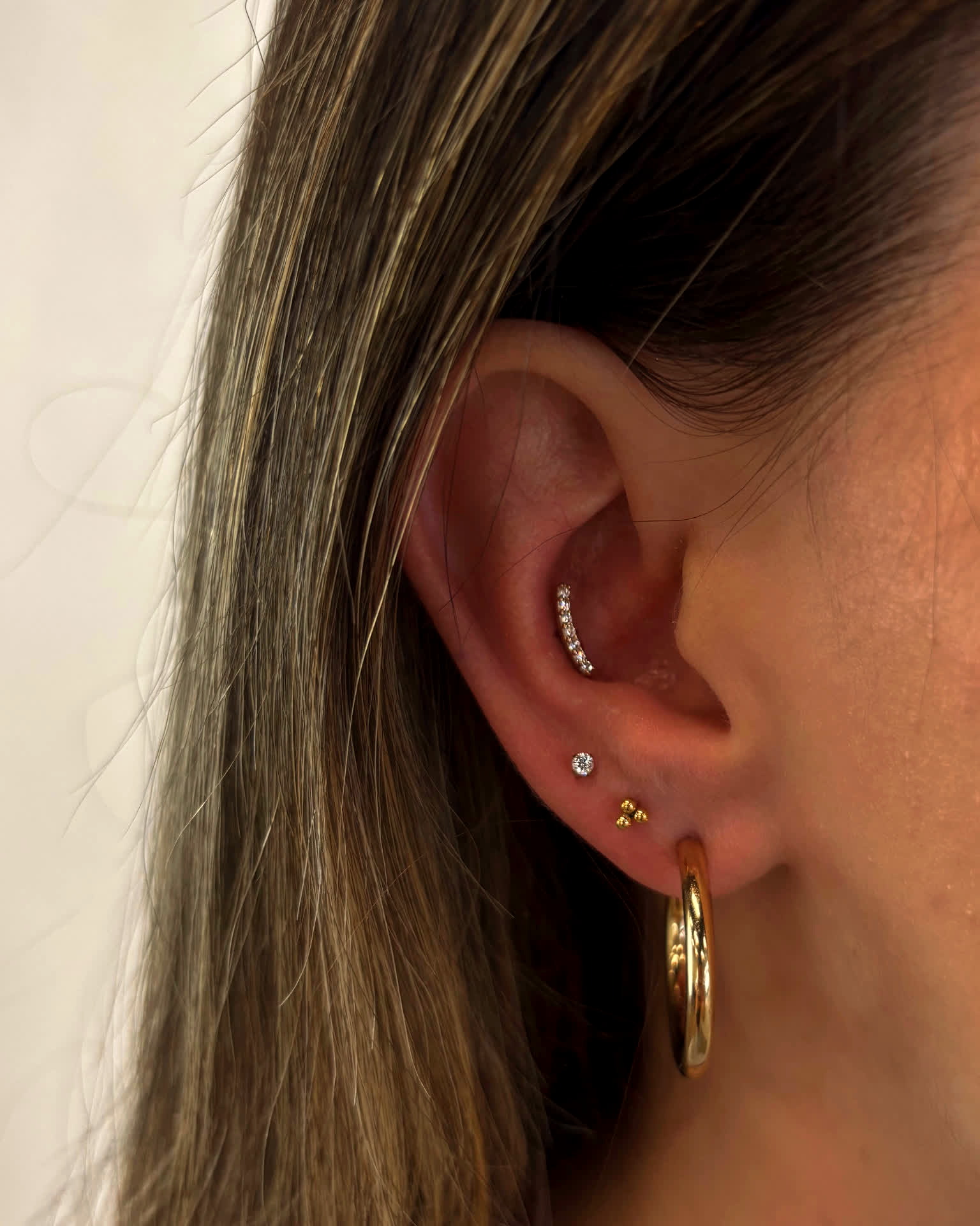 Curated ear piercings