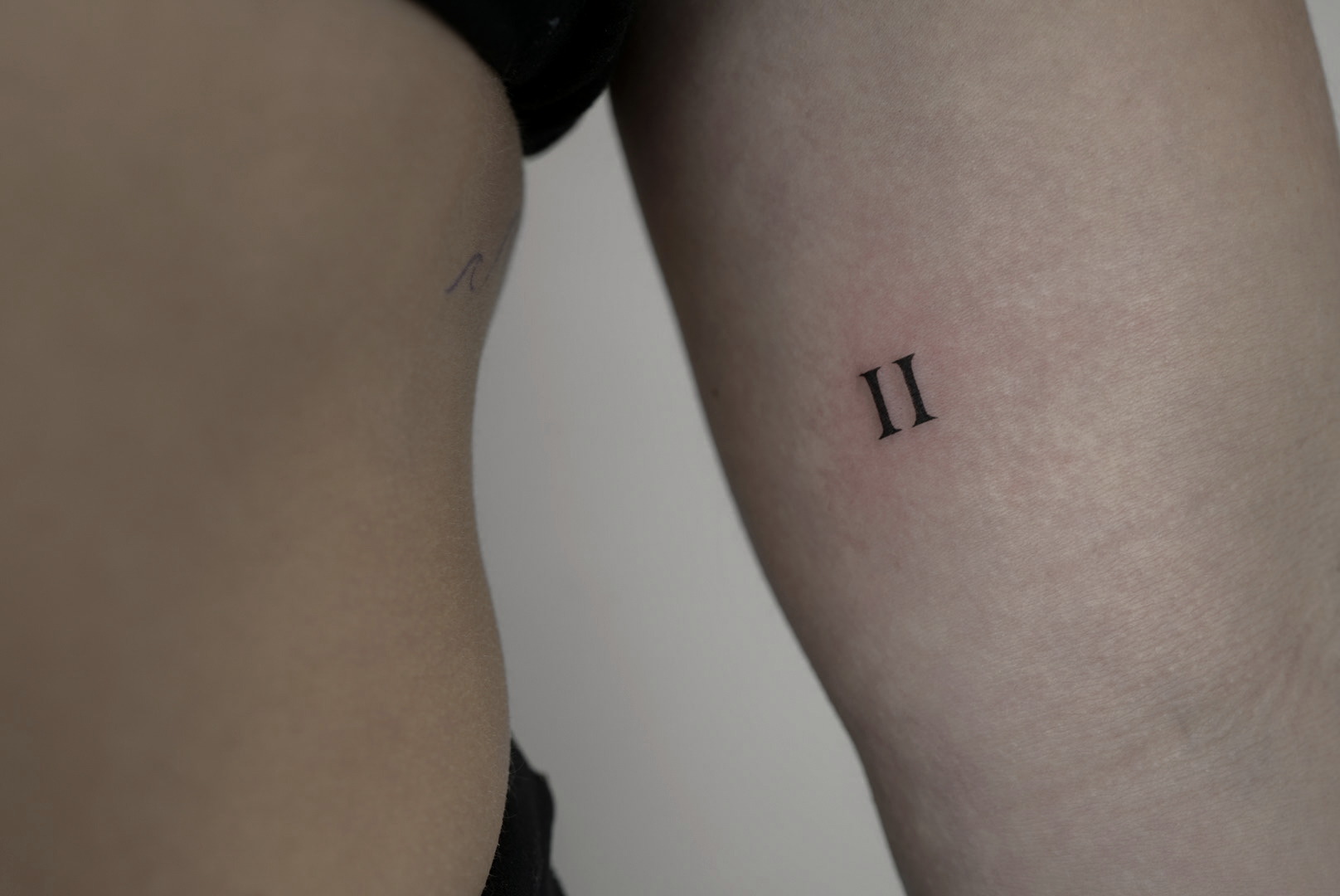 Fine-line tattoo work