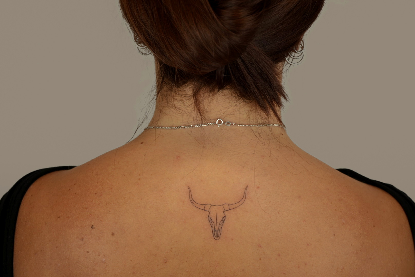 Fine-line tattoo by Studio KEJ