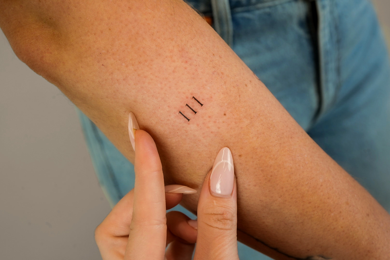 Fine-line tattoo by Studio KEJ