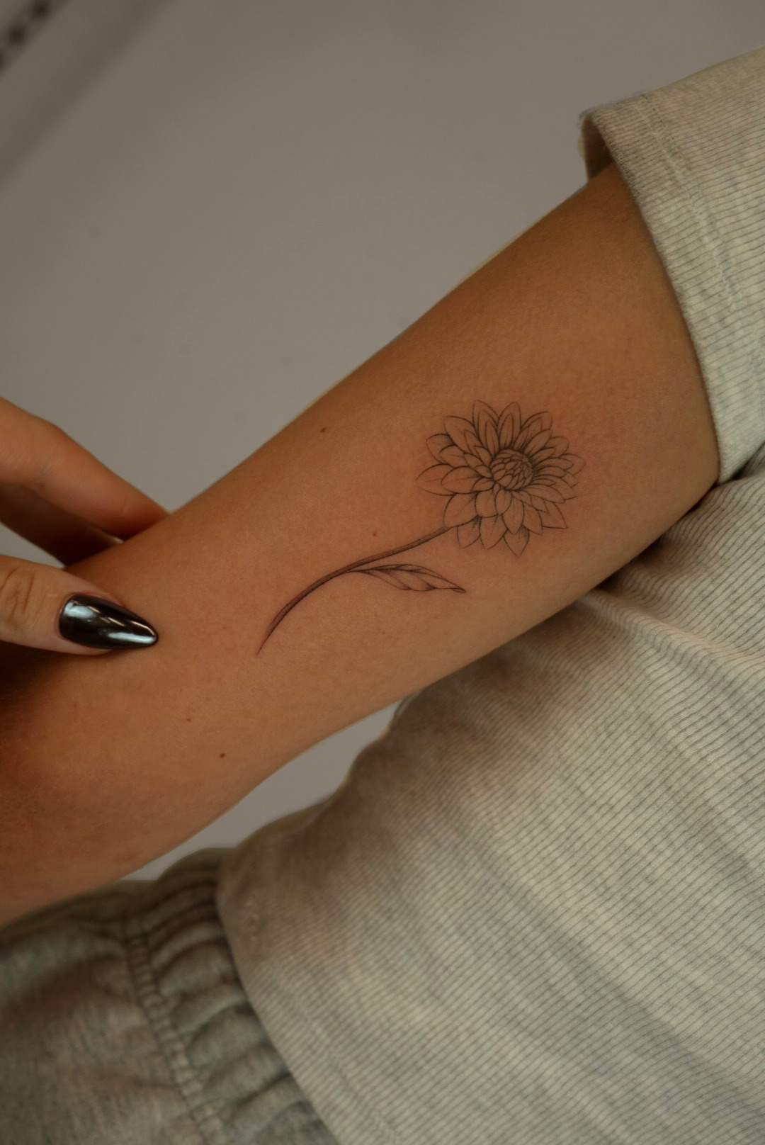 Fine-line tattoo by Studio KEJ