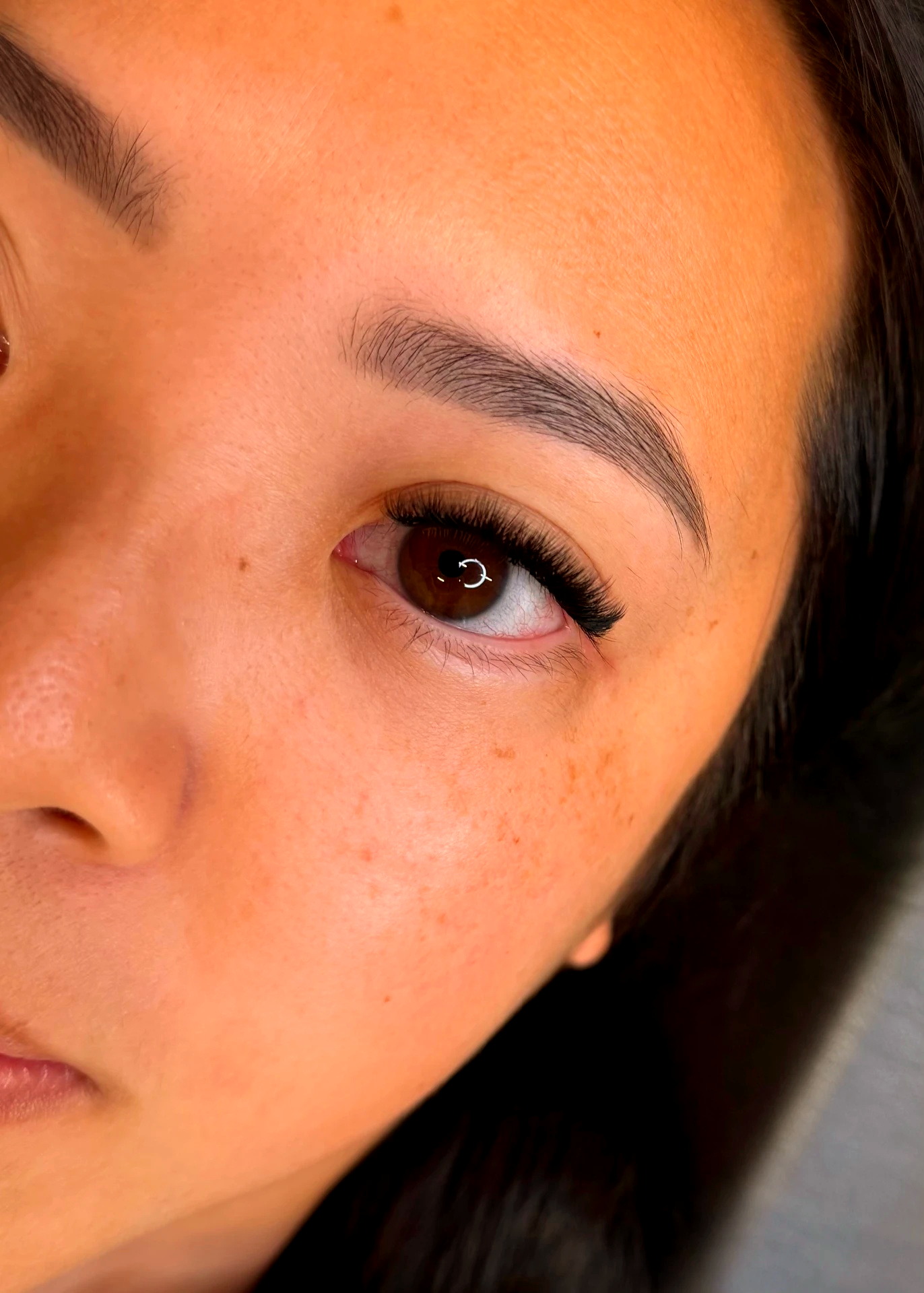 Lash extensions with a soft brow shape