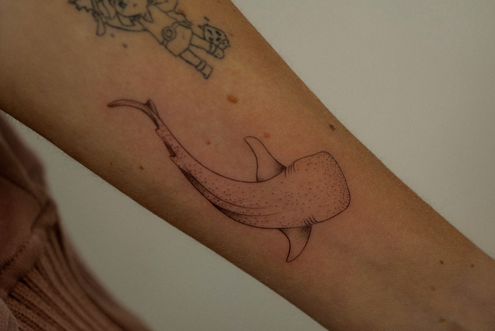 Fine-line tattoo by Studio KEJ