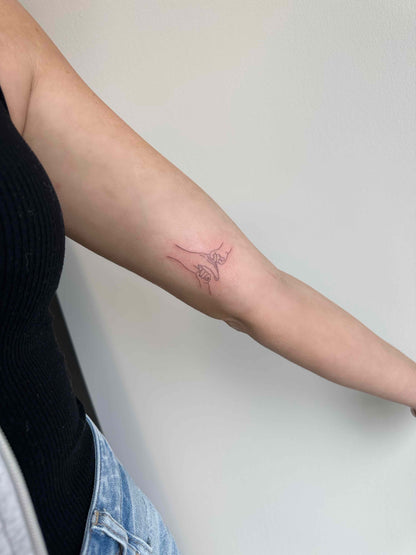 Fine Line Tattoo